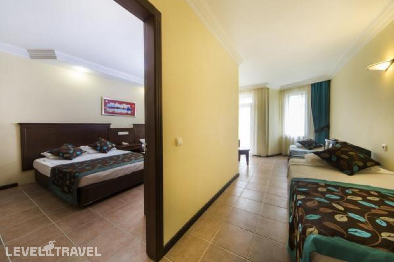 фотографии номера Семейный номер отеля Club Dizalya Hotel в Турция(Конаклы) - фото №1
