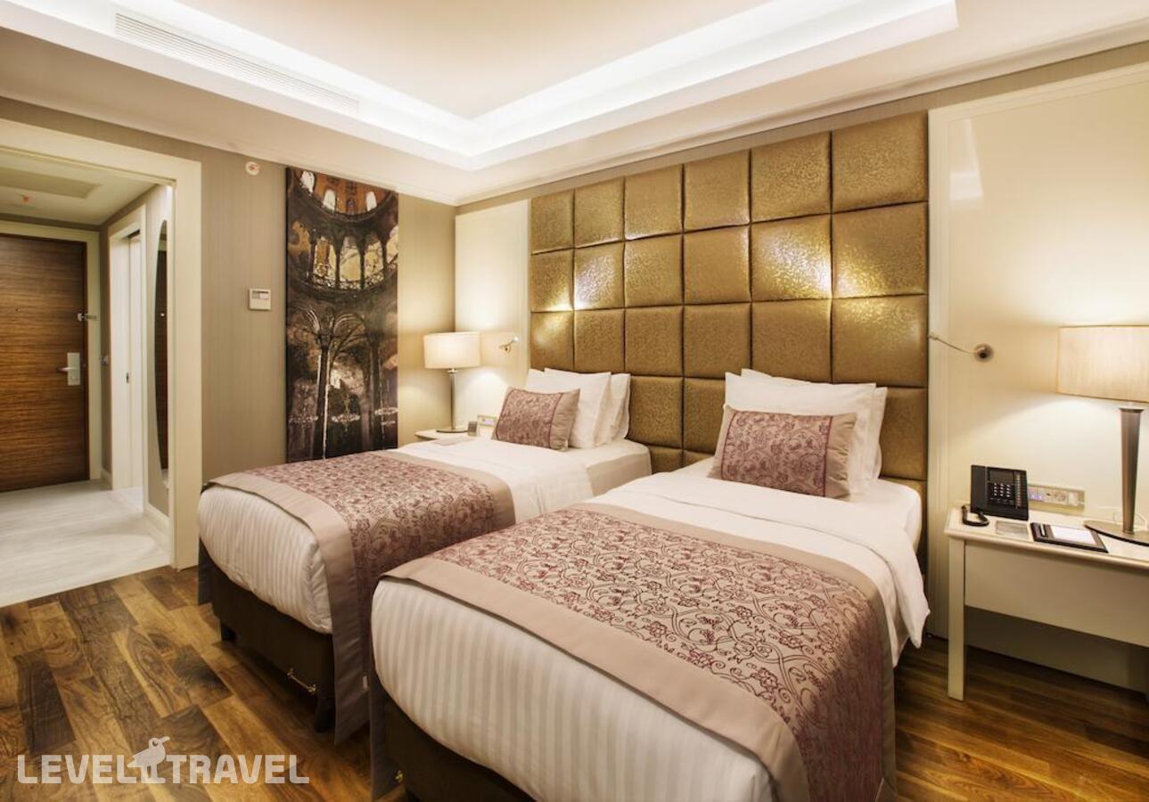 фотографии номера Делюкс с видом на море отеля Dedeman Bostanci Istanbul Hotel & Convention Centre в Турция(Аташехир) - фото №5