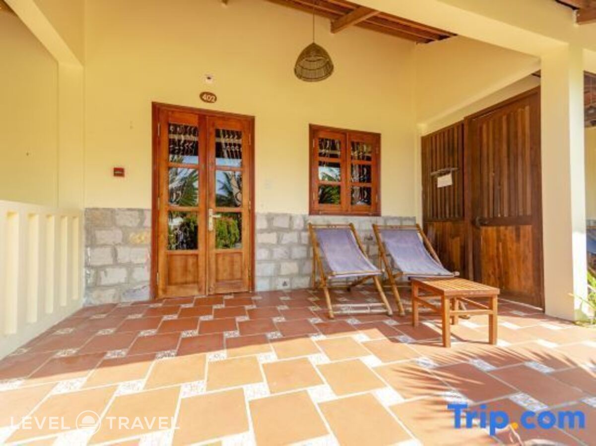 фотографии номера Делюкс с частичным видом на море отеля Phu Quoc Eco Beach Resort в Вьетнам(Фукуок) - фото №5