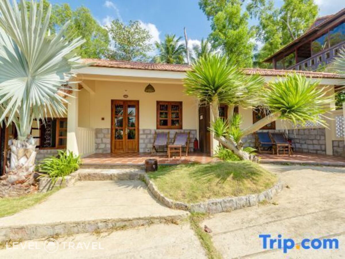 фотографии номера Делюкс с частичным видом на море отеля Phu Quoc Eco Beach Resort в Вьетнам(Фукуок) - фото №4