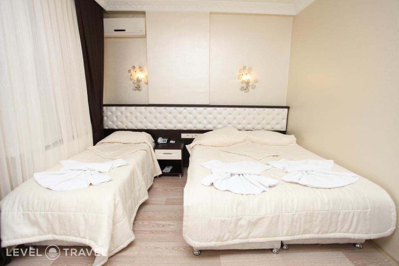 фотографии номера Трехместный номер отеля Broken Column Hotel в Турция(Фатих) - фото №3