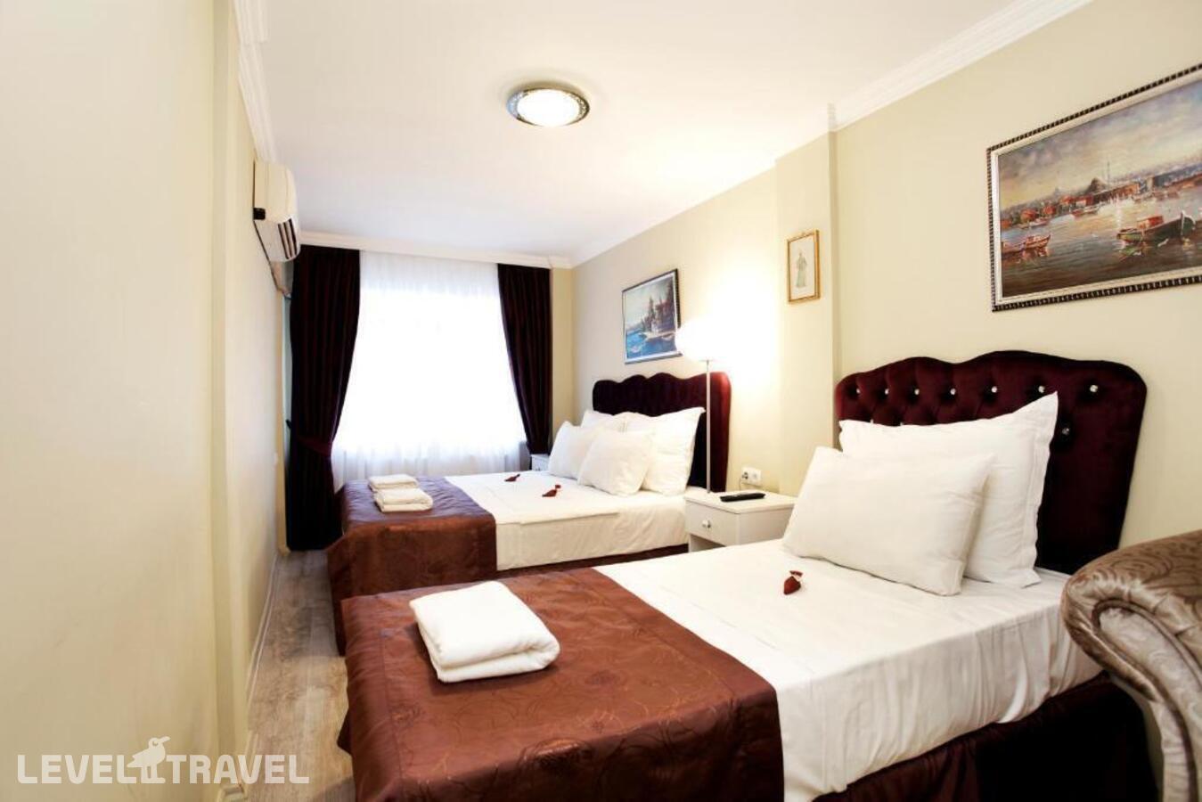 фотографии номера Трехместный номер отеля Spinel Hotel в Турция(Фатих) - фото №39