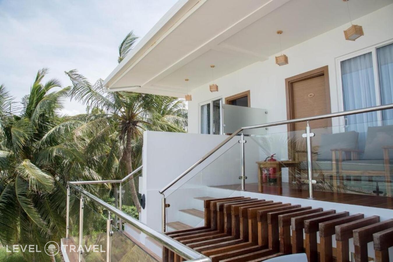 фотографии номера Делюкс с видом на океан (двуспальная кровать) отеля Reef Edge Thulusdhoo Guesthouse в Мальдивы(Тулусду) - фото №3