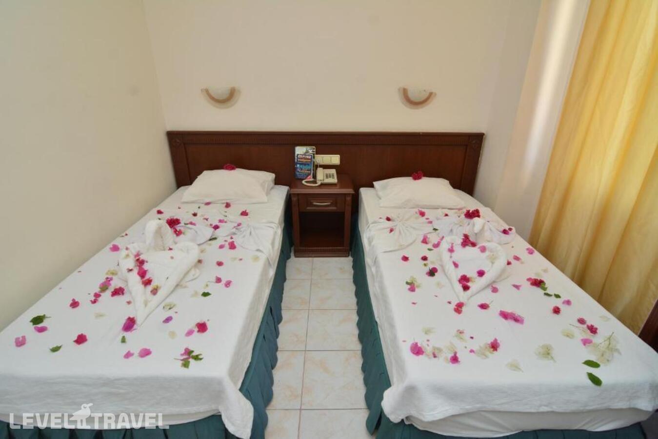 фотографии номера Четырехместный номер отеля Rose Garden Apart Hotel в Турция(Аланья) - фото №4