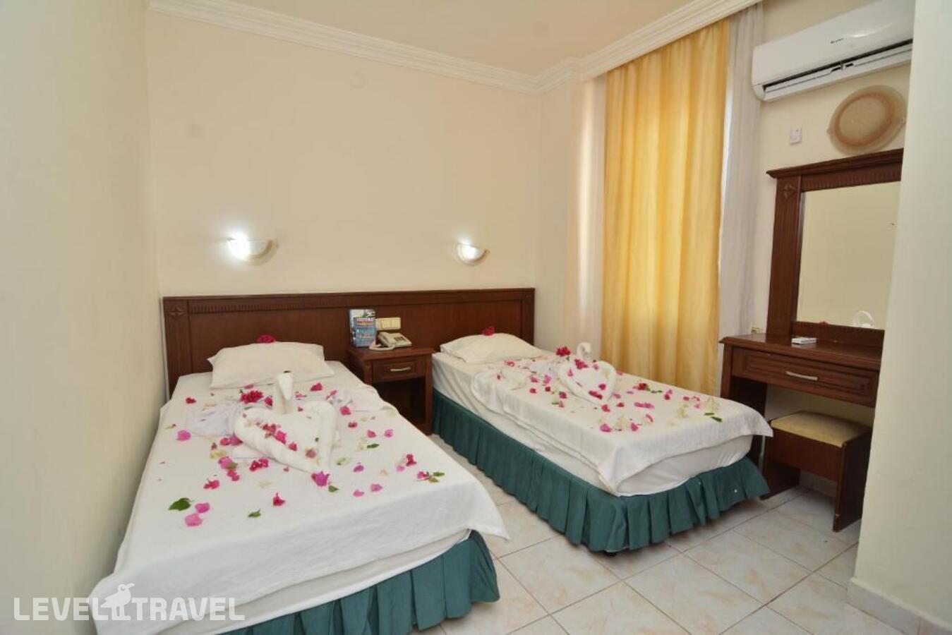 фотографии номера Трехместный номер отеля Rose Garden Apart Hotel в Турция(Аланья) - фото №5