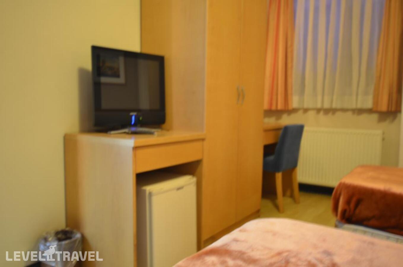 фотографии номера Трехместный номер отеля Hotel Inter Istanbul в Турция(Фатих) - фото №2