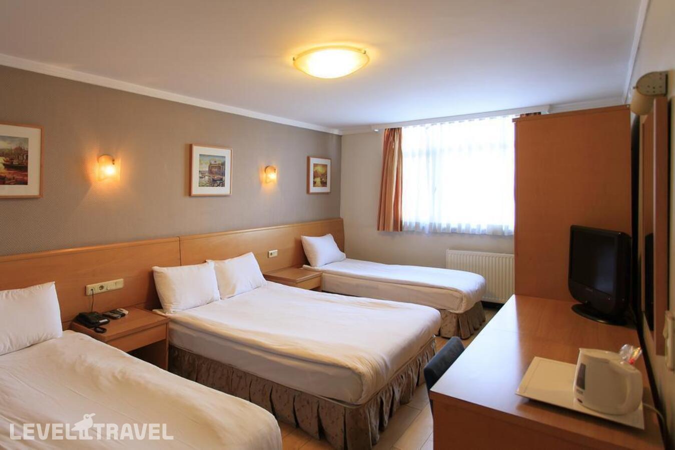 фотографии номера Трехместный номер отеля Hotel Inter Istanbul в Турция(Фатих) - фото №8