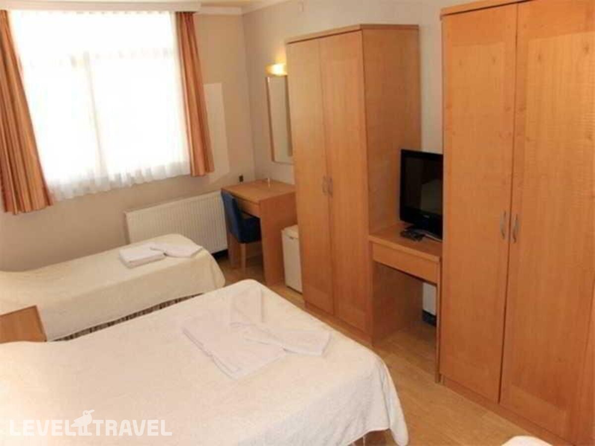 фотографии номера Трехместный номер отеля Hotel Inter Istanbul в Турция(Фатих) - фото №20