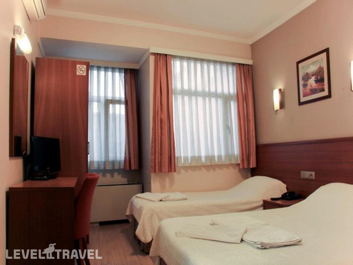 фотографии номера Трехместный номер отеля Hotel Inter Istanbul в Турция(Фатих) - фото №5