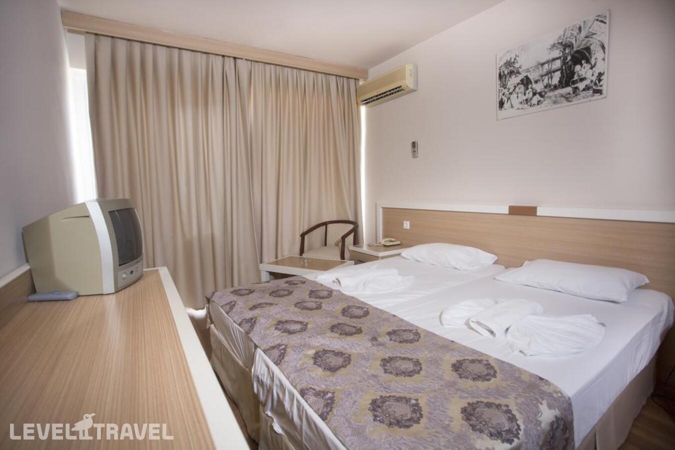 фотографии номера Стандартный номер отеля Tuntas Beach Hotel в Турция(Дидим) - фото №1