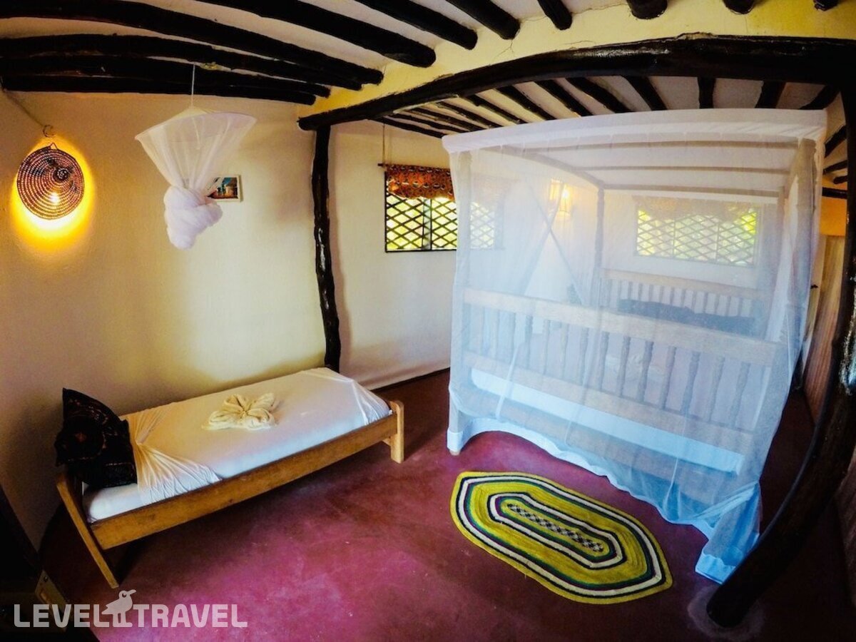фотографии номера Номер Гранд отеля Evergreen Bungalows в Танзания(Донгве Бич) - фото №4