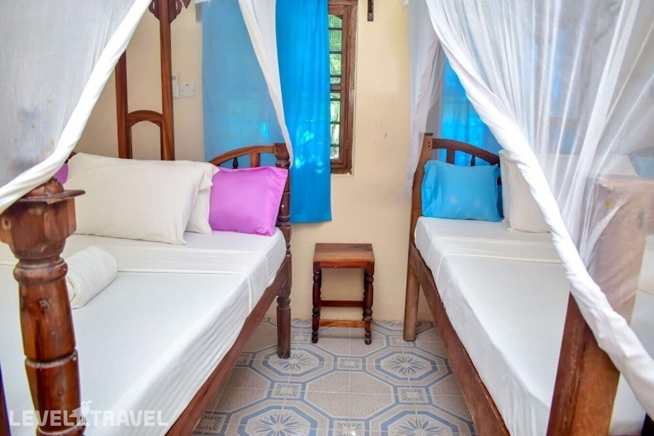 фотографии номера Стандартный с видом на сад отеля Blue Earth Beach Bungalows в Танзания(Джамбиани) - фото №6