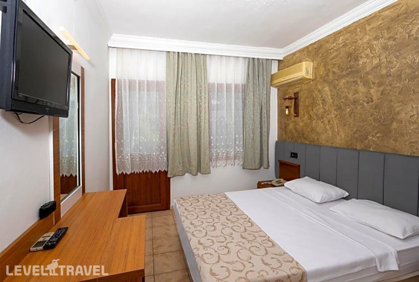 фотографии номера Стандартный номер отеля Gumbet Anil Beach Hotel в Турция(Гюмбет) - фото №13
