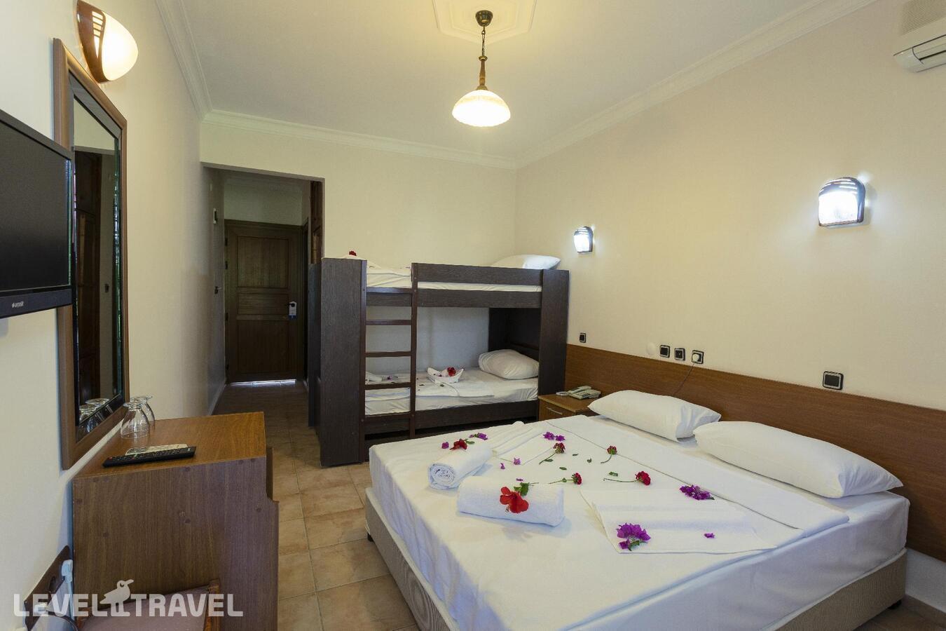 фотографии номера Стандартный номер отеля Gumbet Anil Beach Hotel в Турция(Гюмбет) - фото №2