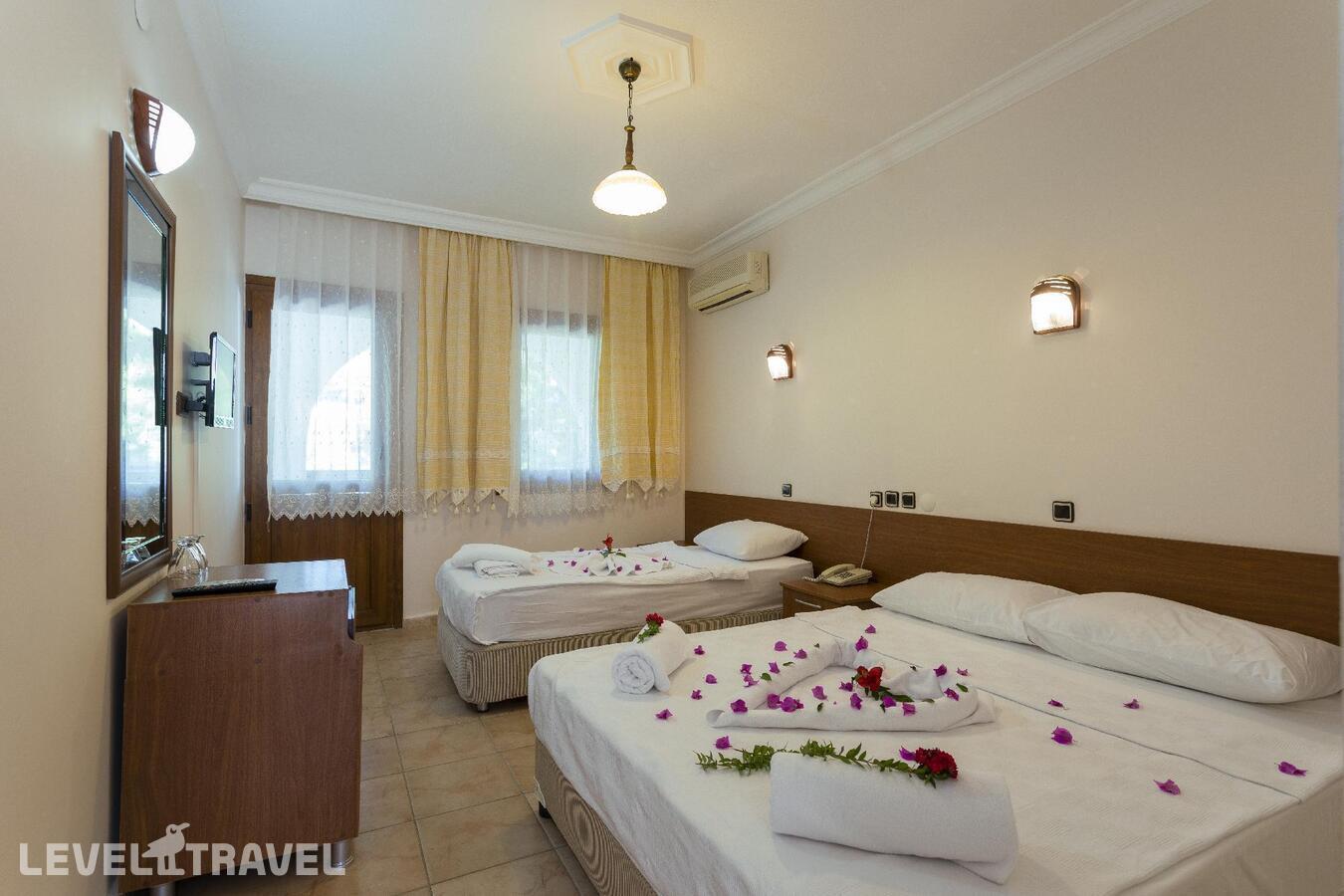 фотографии номера Стандартный номер отеля Gumbet Anil Beach Hotel в Турция(Гюмбет) - фото №1