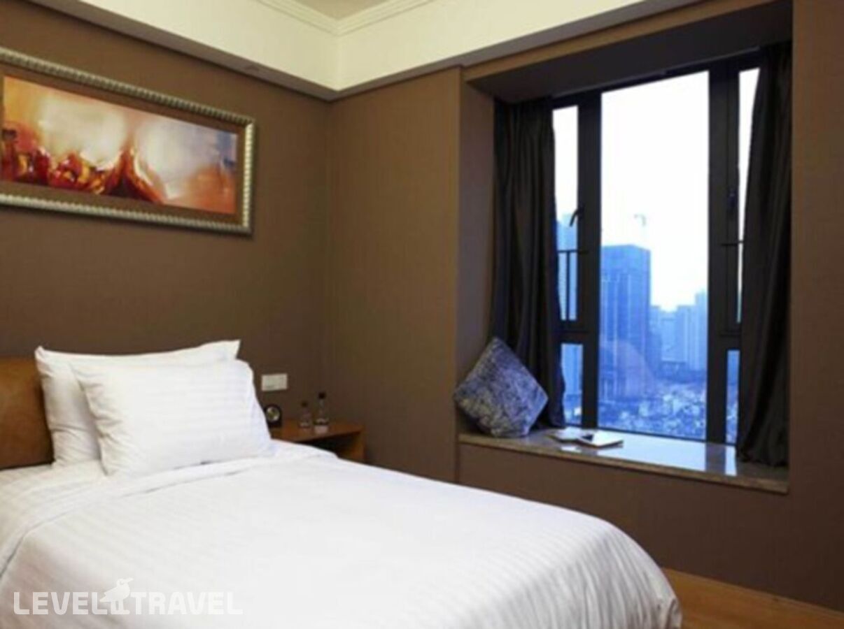фотографии номера Стандартный номер отеля Dan Executive Apartment Guangzhou в Китай(Гуанчжоу) - фото №1