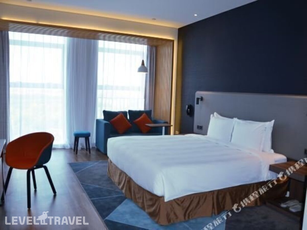фотографии номера Семейный номер отеля Holiday Inn Express Harbin Qunli в Китай(Харбин) - фото №27