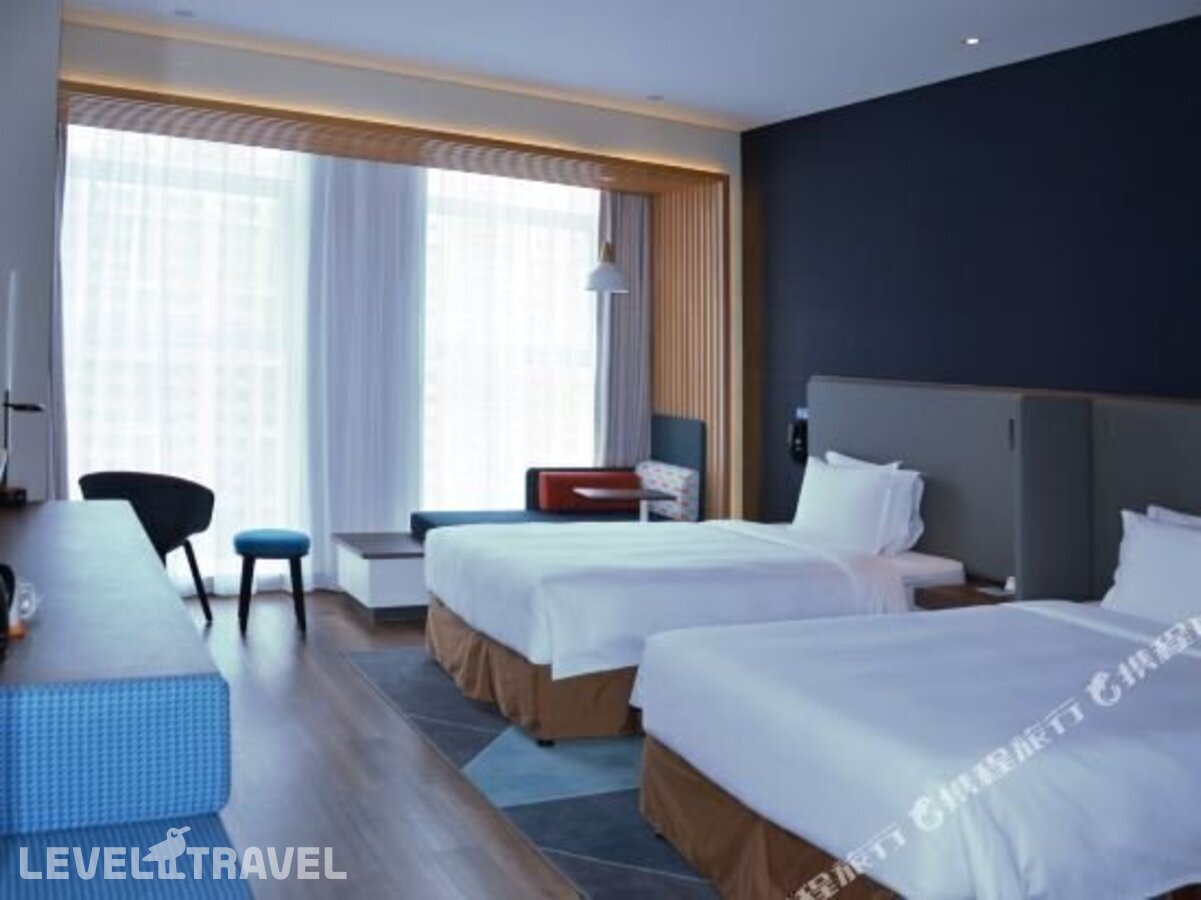 фотографии номера Семейный номер отеля Holiday Inn Express Harbin Qunli в Китай(Харбин) - фото №29