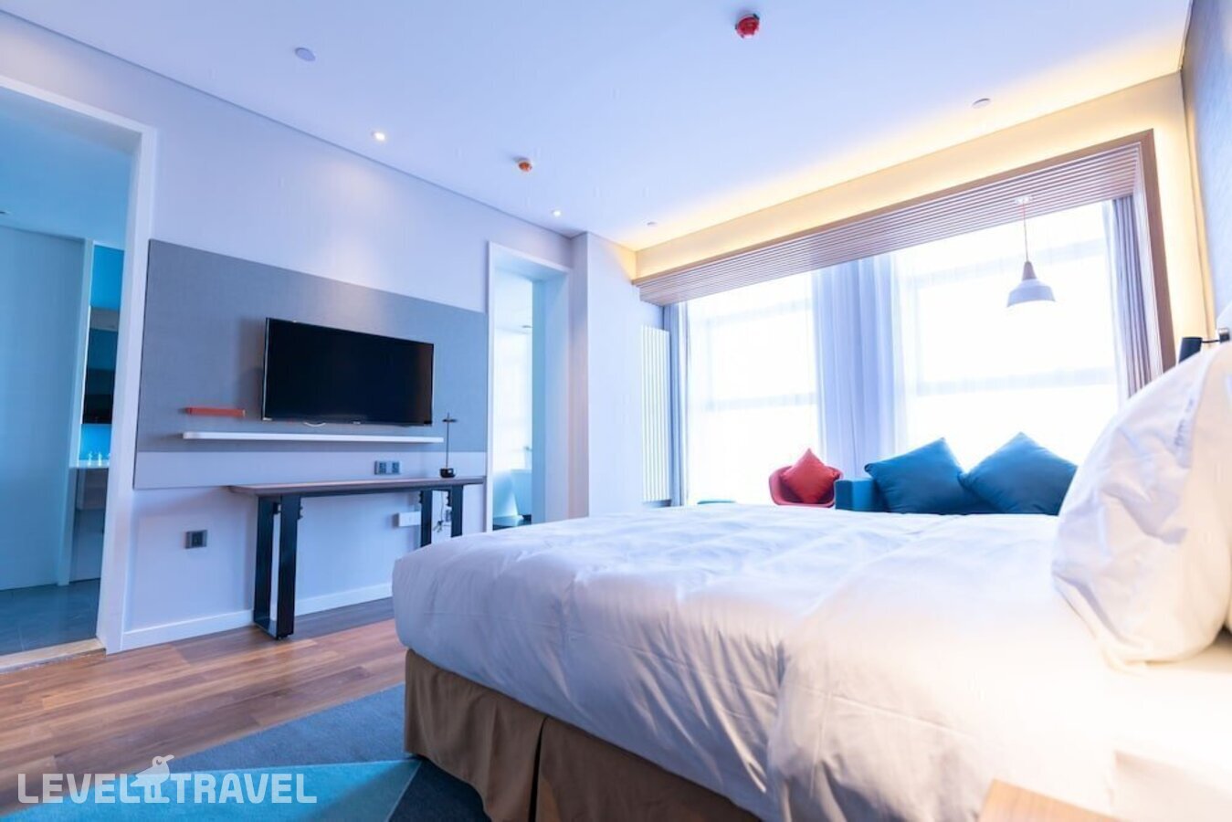 фотографии номера Семейный номер отеля Holiday Inn Express Harbin Qunli в Китай(Харбин) - фото №7