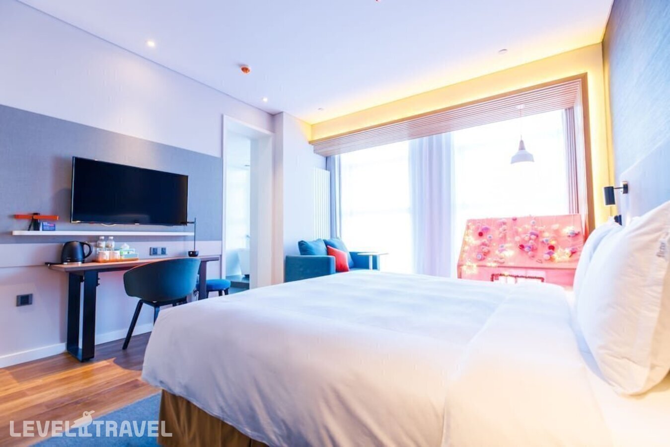 фотографии номера Семейный номер отеля Holiday Inn Express Harbin Qunli в Китай(Харбин) - фото №14