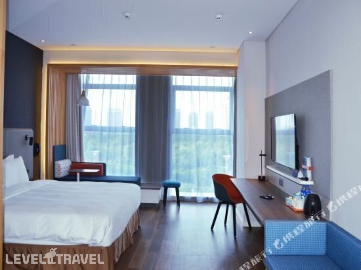 фотографии номера Семейный номер отеля Holiday Inn Express Harbin Qunli в Китай(Харбин) - фото №26