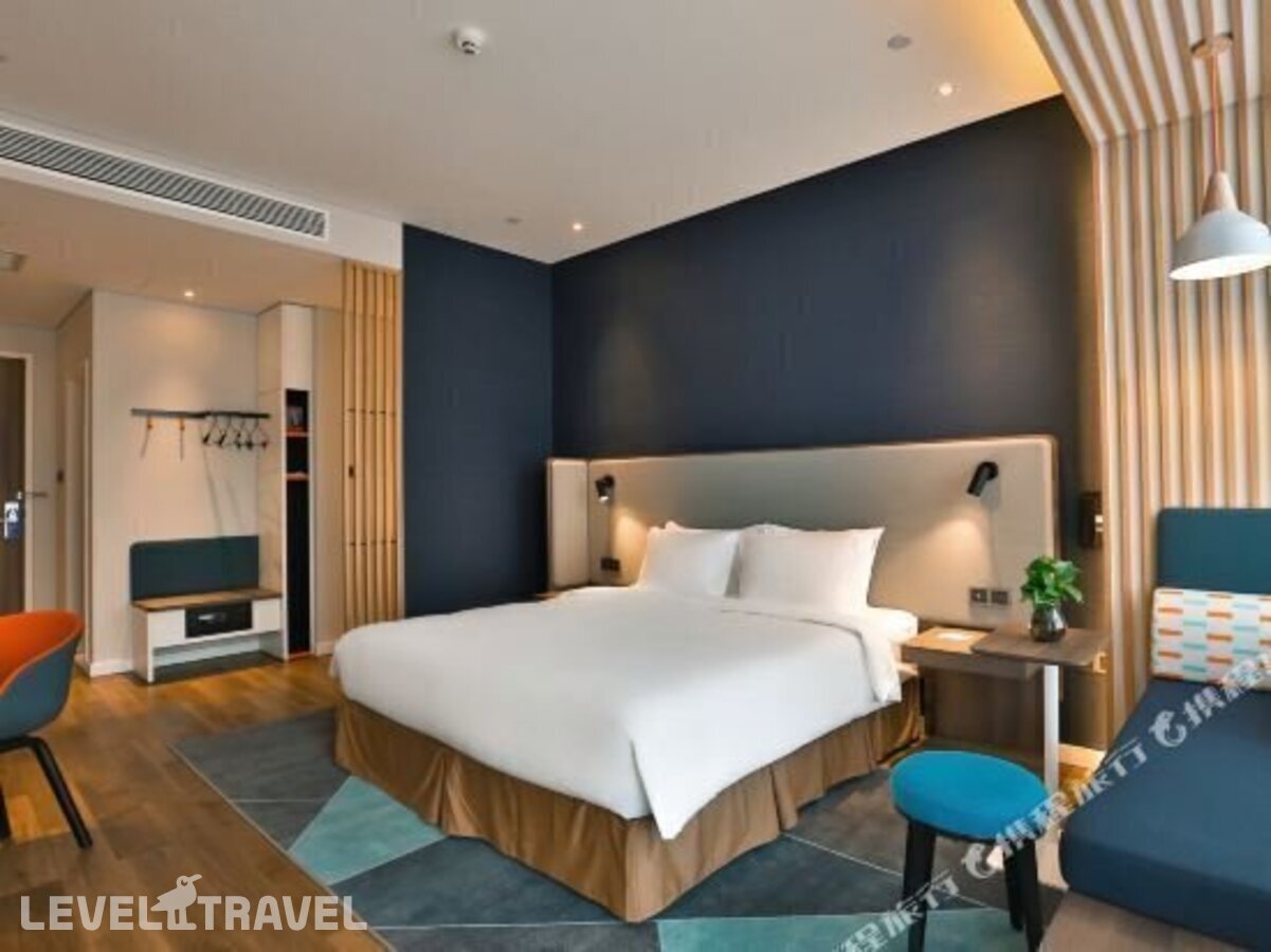 фотографии номера Семейный номер отеля Holiday Inn Express Harbin Qunli в Китай(Харбин) - фото №36