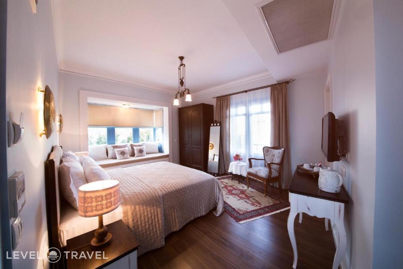 фотографии номера Делюкс с видом на сад с балконом отеля Viento Hotel Alacati - Special Class в Турция(Чешме) - фото №13