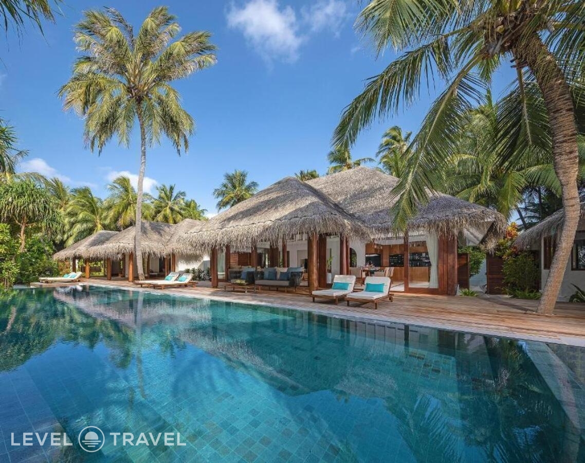 фотографии номера Пляжная резиденция (4 спальни) отеля Anantara Kihavah Villas в Мальдивы(Баа Атолл) - фото №1