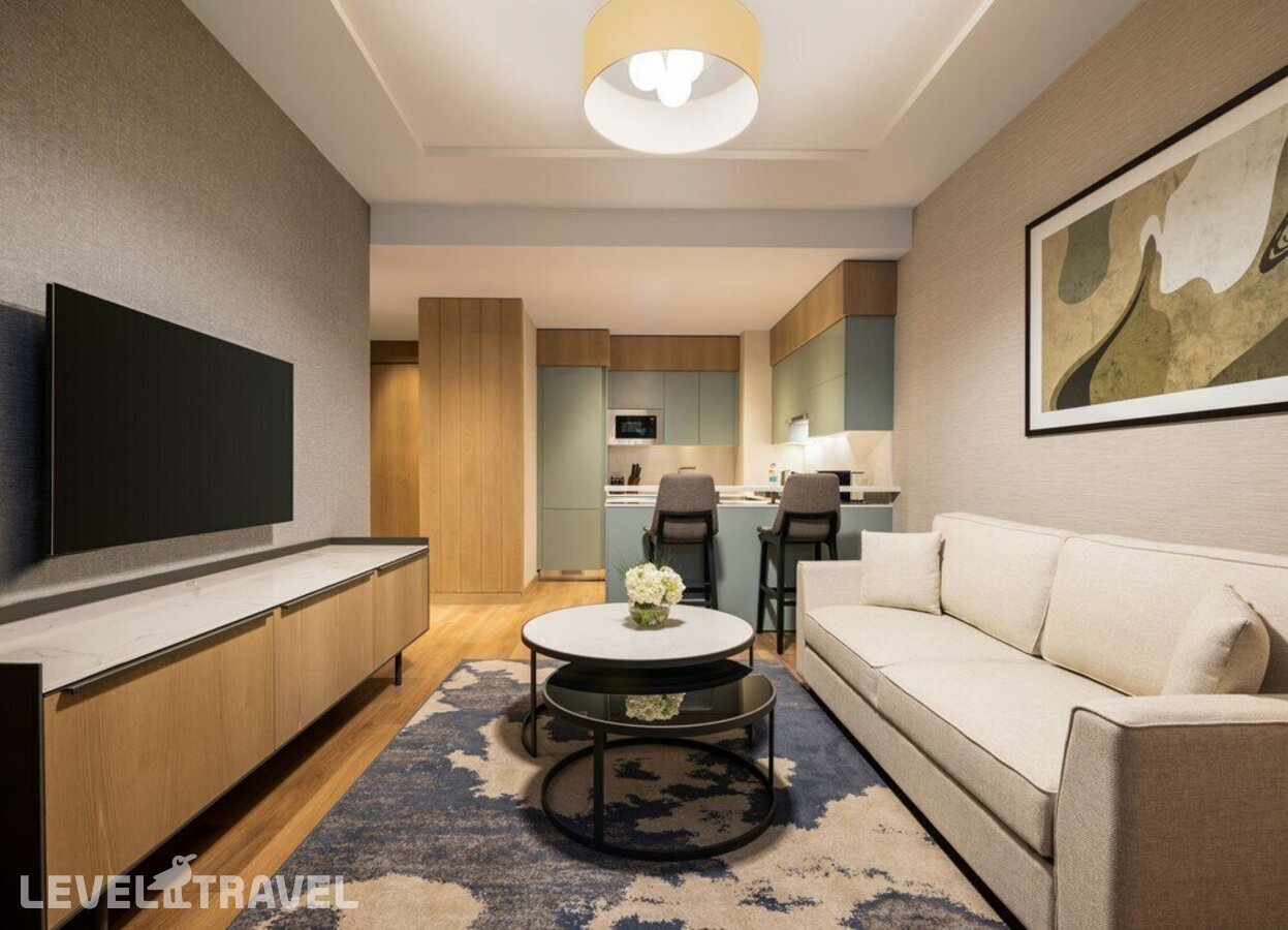 фотографии номера Улучшенные апартаменты отеля Movenpick Living Istanbul Camlivadi в Турция(Кягытхане) - фото №2