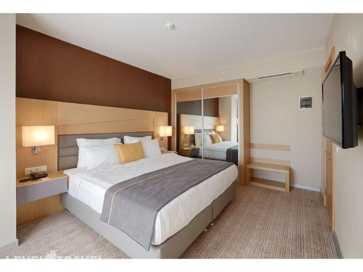 фотографии номера Стандартный номер отеля Kordon Hotel Cankaya в Турция(Измир) - фото №8