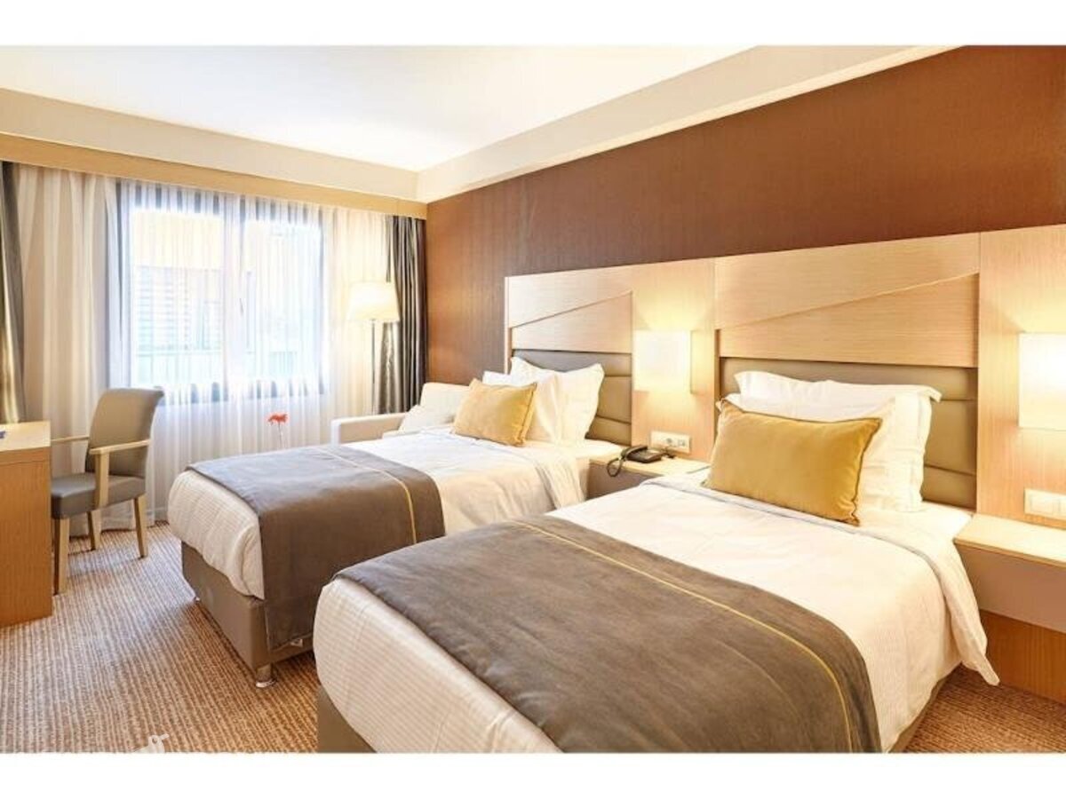 фотографии номера Стандартный номер отеля Kordon Hotel Cankaya в Турция(Измир) - фото №7