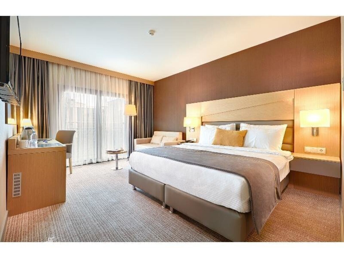 фотографии номера Стандартный номер отеля Kordon Hotel Cankaya в Турция(Измир) - фото №2