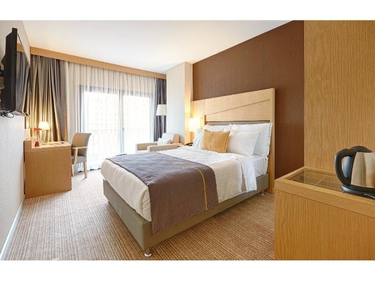 фотографии номера Стандартный номер отеля Kordon Hotel Cankaya в Турция(Измир) - фото №6