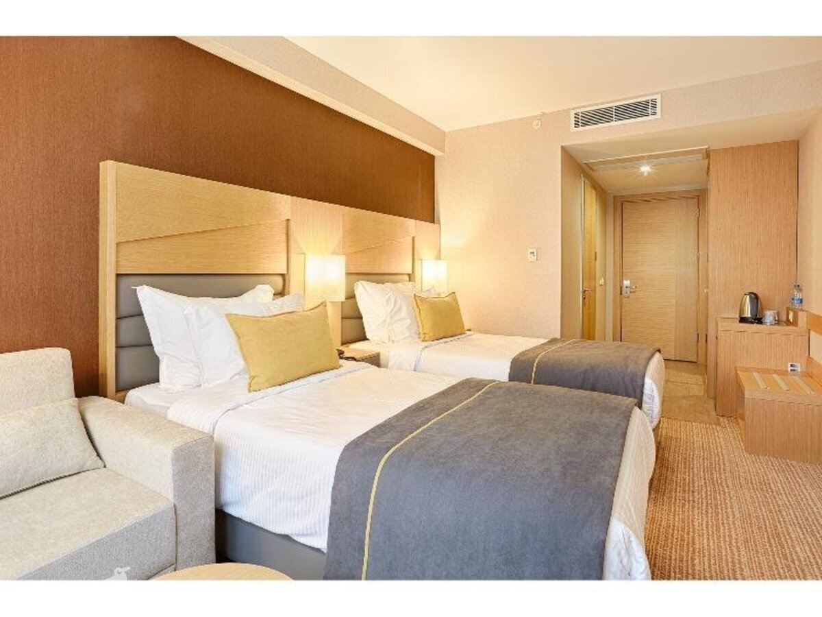 фотографии номера Трехместный Комфорт отеля Kordon Hotel Cankaya в Турция(Измир) - фото №2