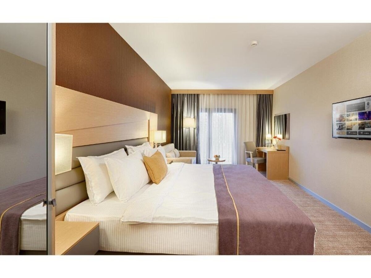 фотографии номера Делюкс отеля Kordon Hotel Cankaya в Турция(Измир) - фото №1
