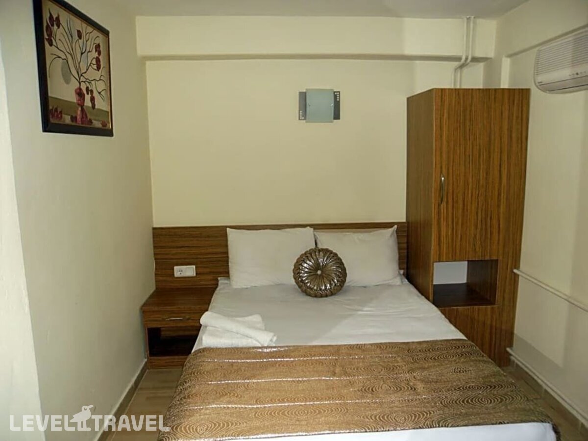 фотографии номера Экономичный номер отеля Olimpiyat Otel Izmir в Турция(Измир) - фото №6