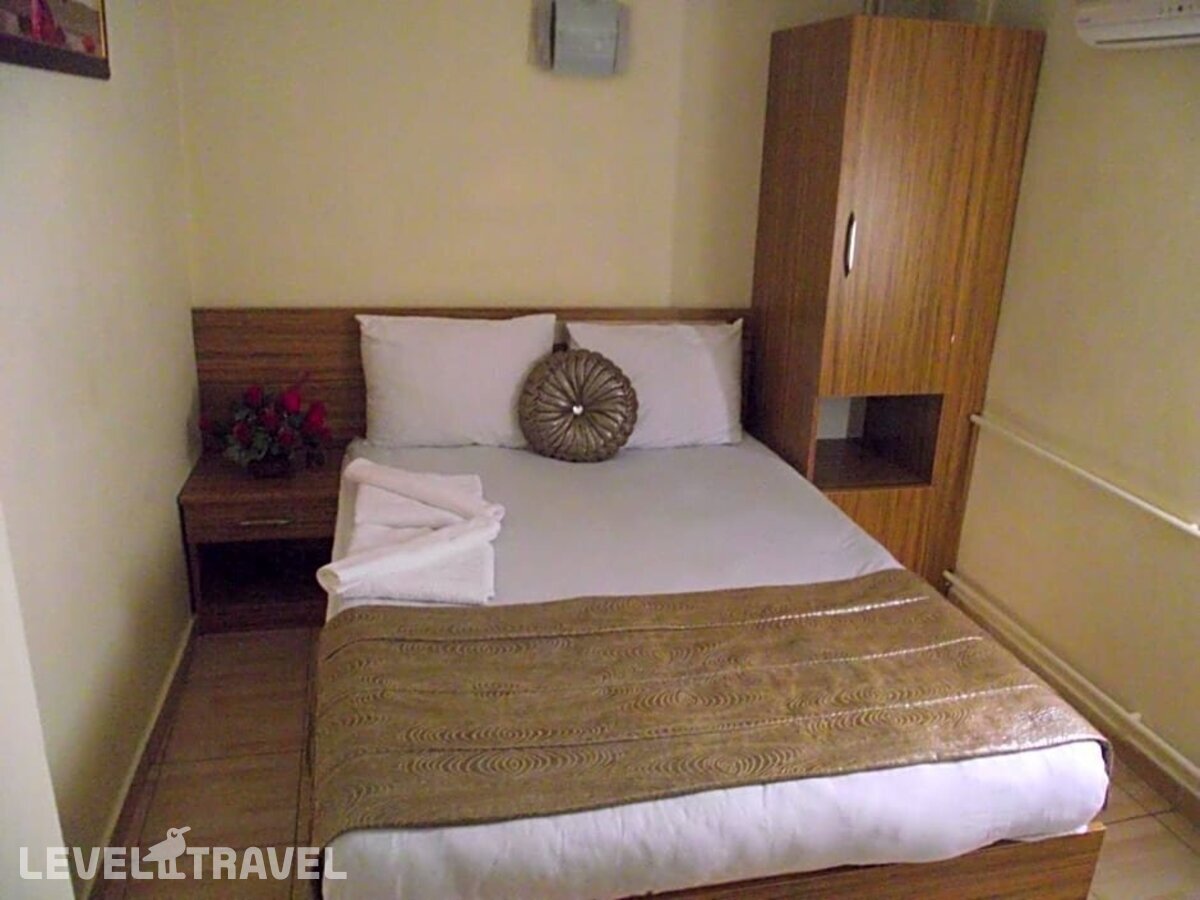 фотографии номера Экономичный номер отеля Olimpiyat Otel Izmir в Турция(Измир) - фото №4