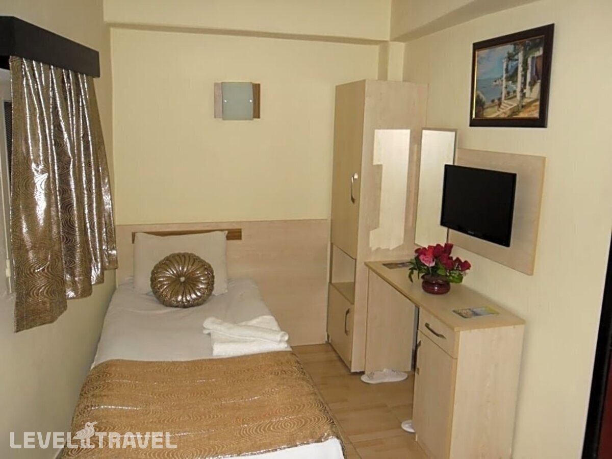фотографии номера Экономичный номер отеля Olimpiyat Otel Izmir в Турция(Измир) - фото №5