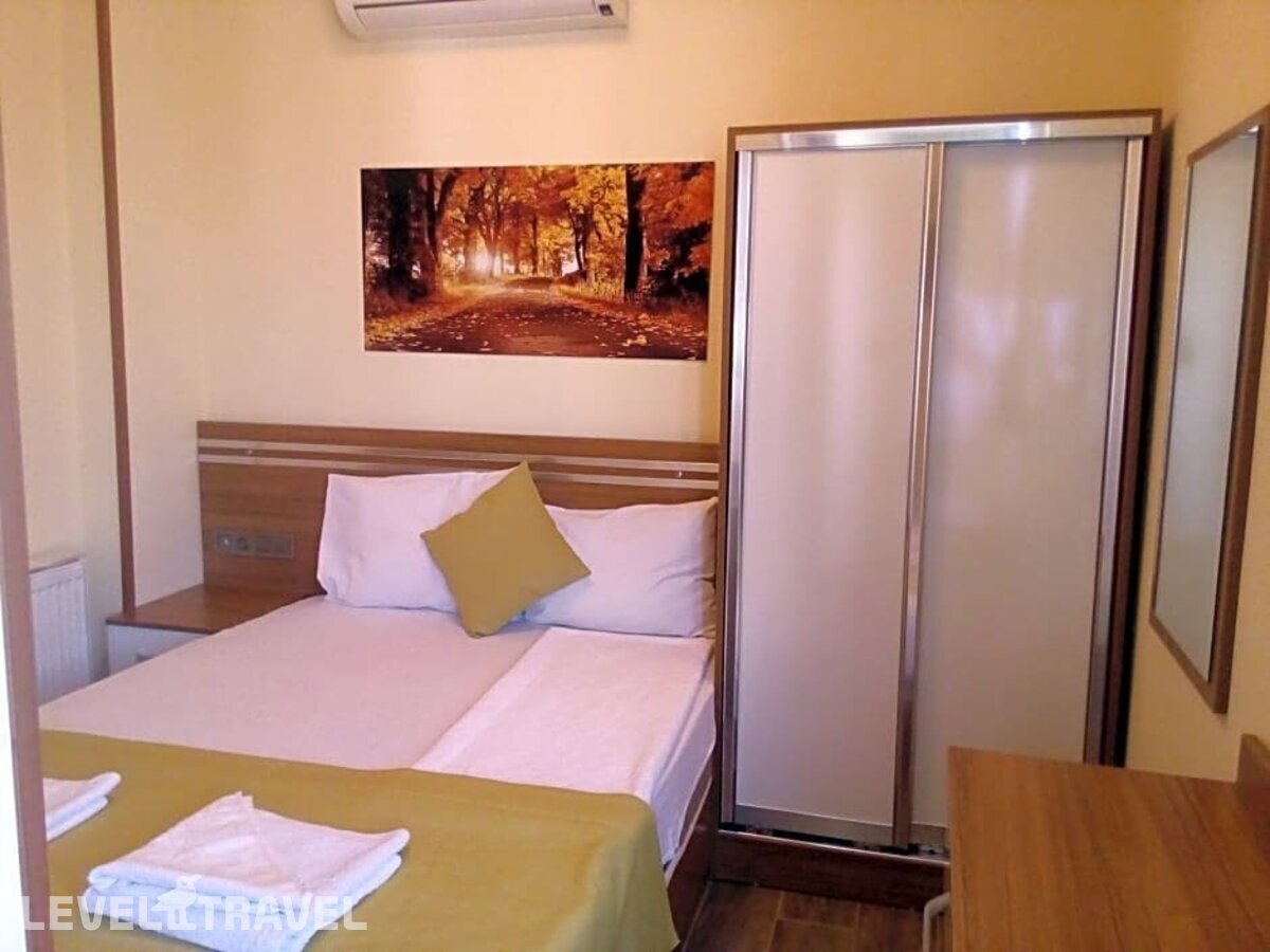 фотографии номера Стандартный номер отеля Olimpiyat Otel Izmir в Турция(Измир) - фото №1