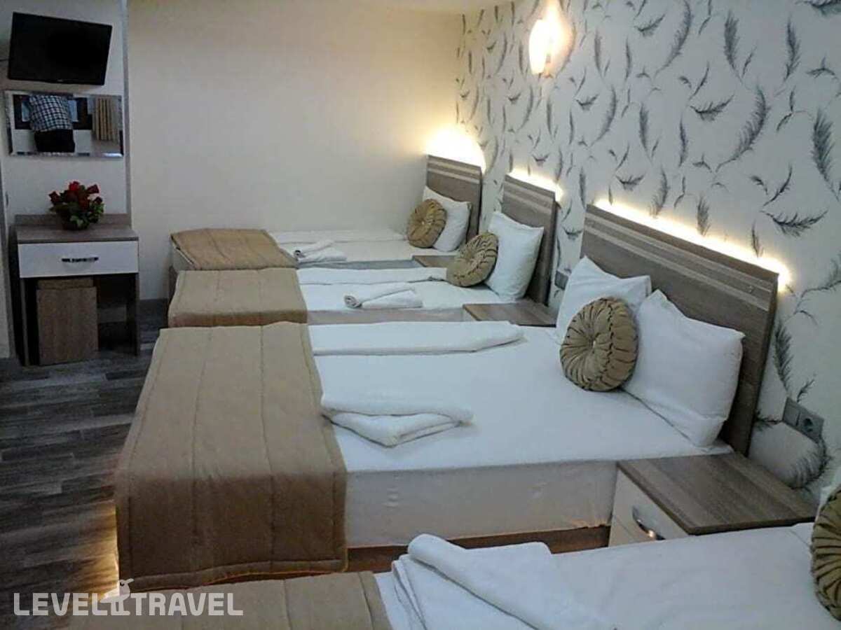 фотографии номера Стандартный номер отеля Olimpiyat Otel Izmir в Турция(Измир) - фото №3