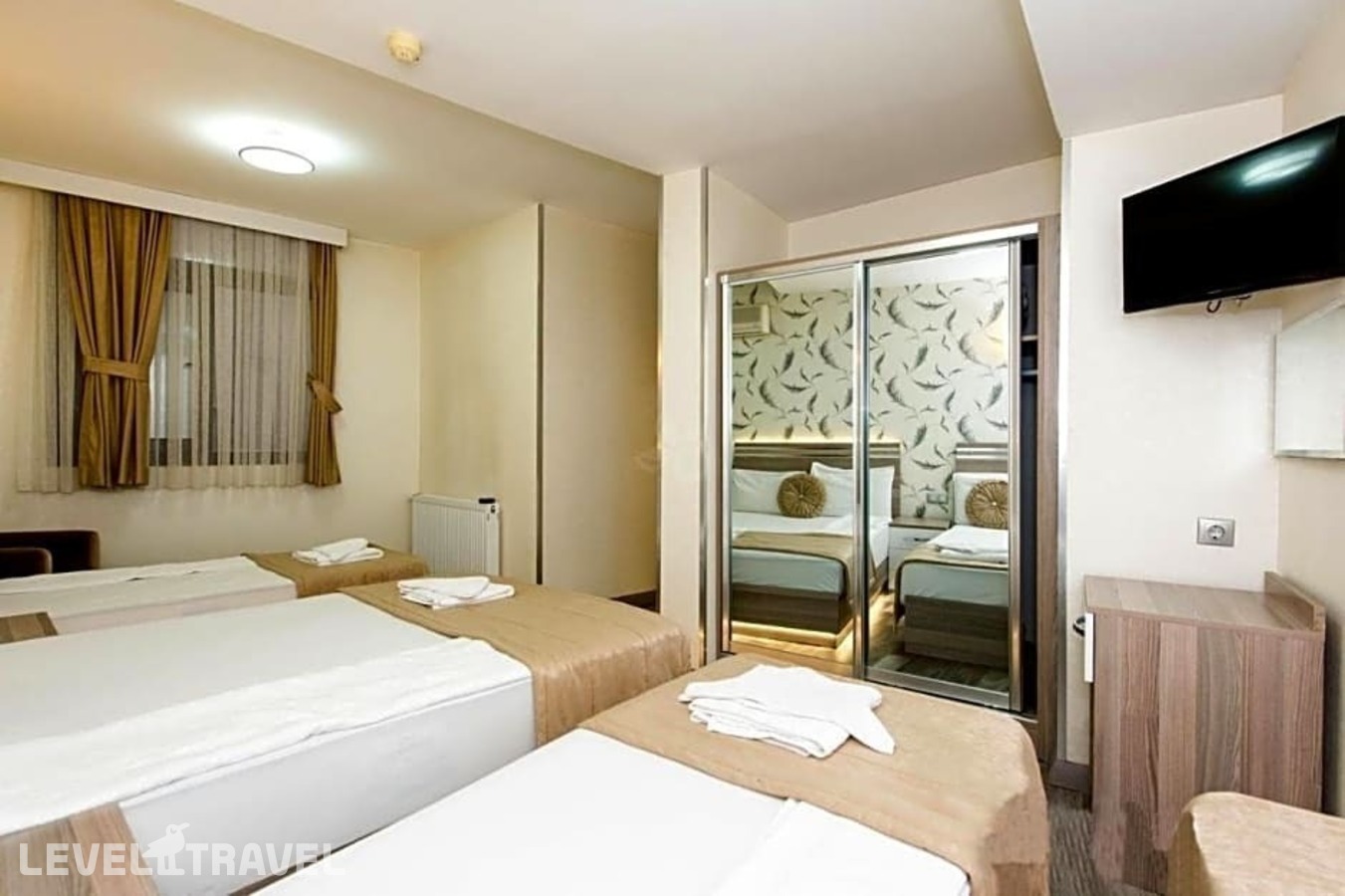 фотографии номера Стандартный (две односпальные кровати) отеля Olimpiyat Otel Izmir в Турция(Измир) - фото №14