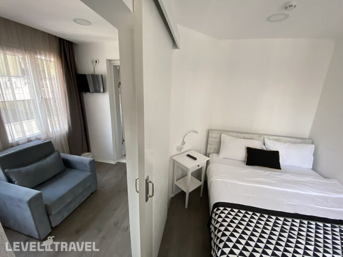 фотографии номера Улучшенный с балконом отеля Piano Hotel в Турция(Измир) - фото №3