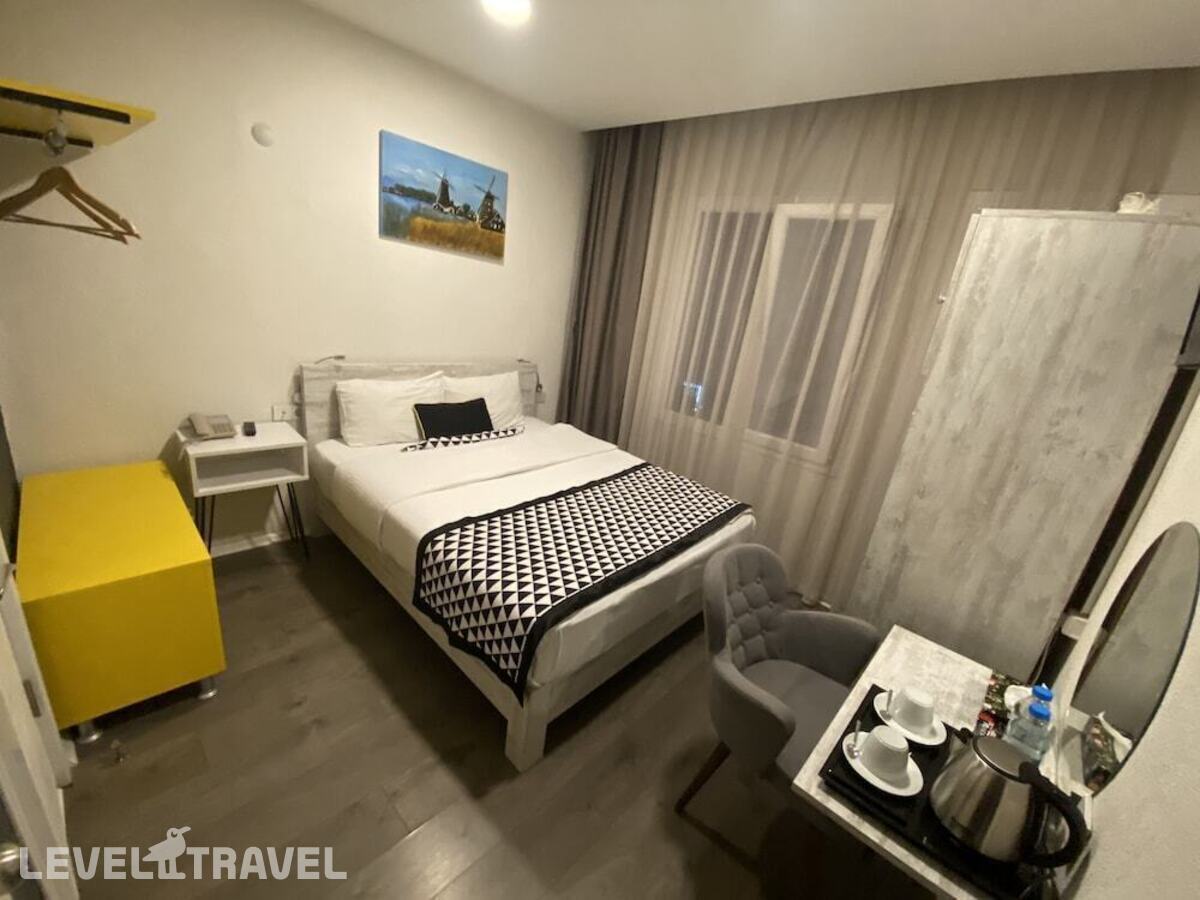 фотографии номера Улучшенный с балконом отеля Piano Hotel в Турция(Измир) - фото №1