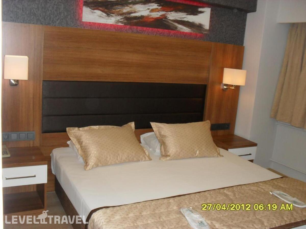 фотографии номера Стандартный номер отеля Otel Kabacam в Турция(Измир) - фото №1