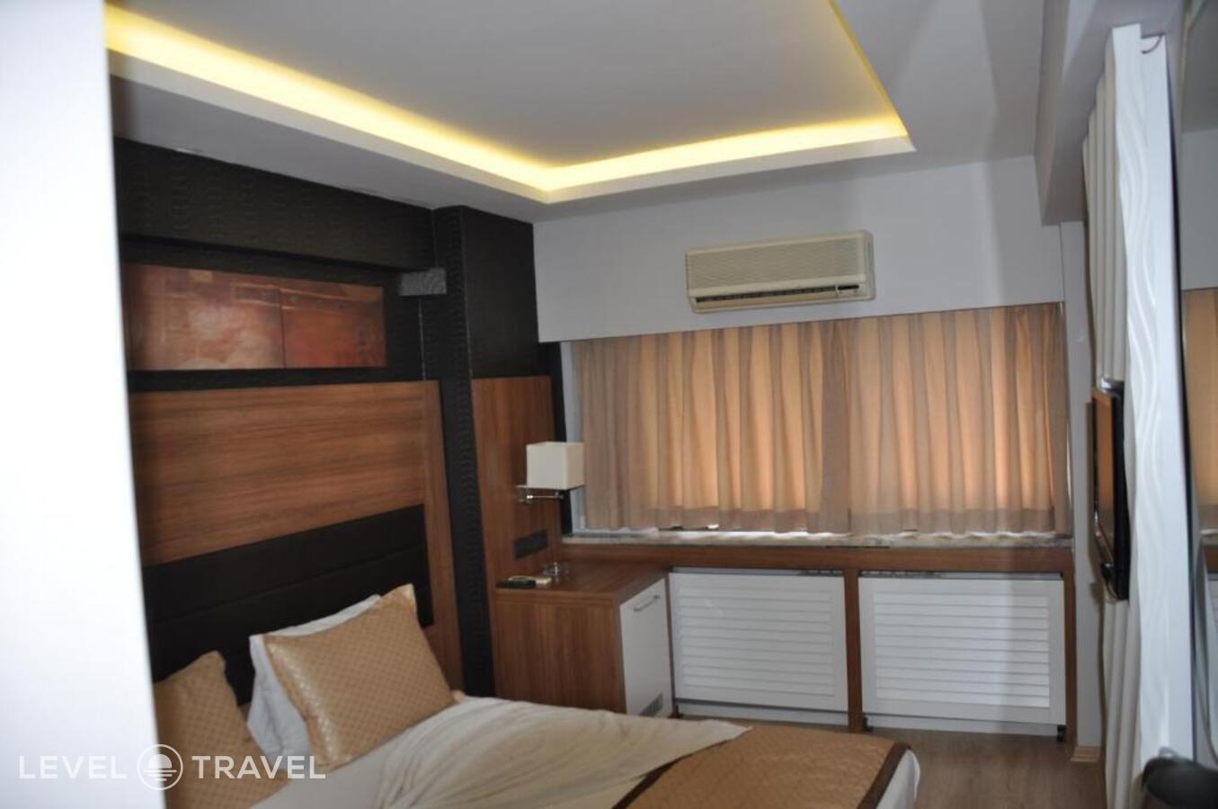 фотографии номера Стандартный номер отеля Otel Kabacam в Турция(Измир) - фото №21
