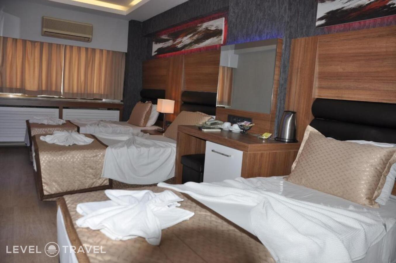 фотографии номера Трехместный номер отеля Otel Kabacam в Турция(Измир) - фото №17