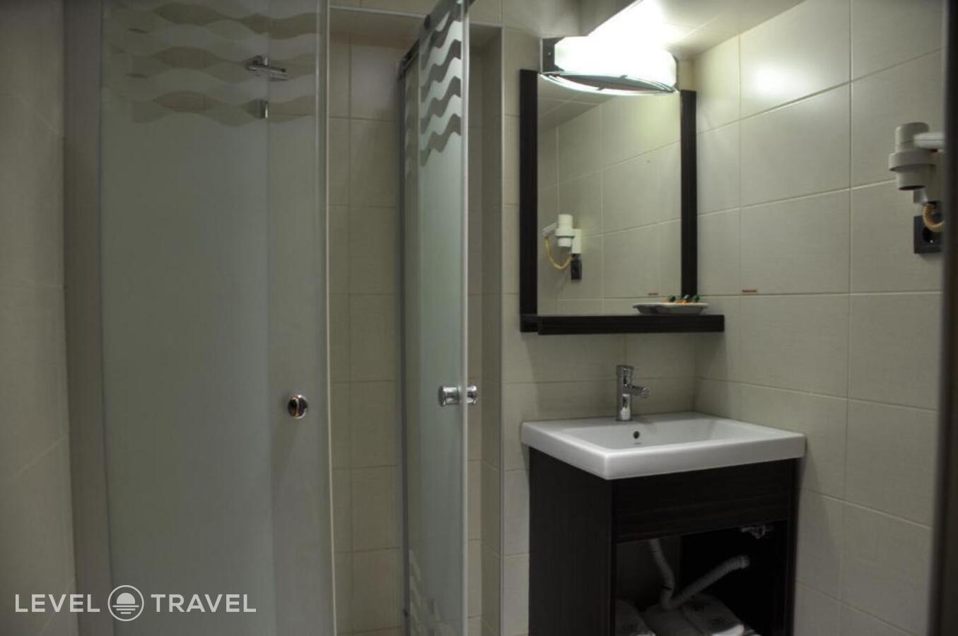 фотографии номера Трехместный номер отеля Otel Kabacam в Турция(Измир) - фото №21