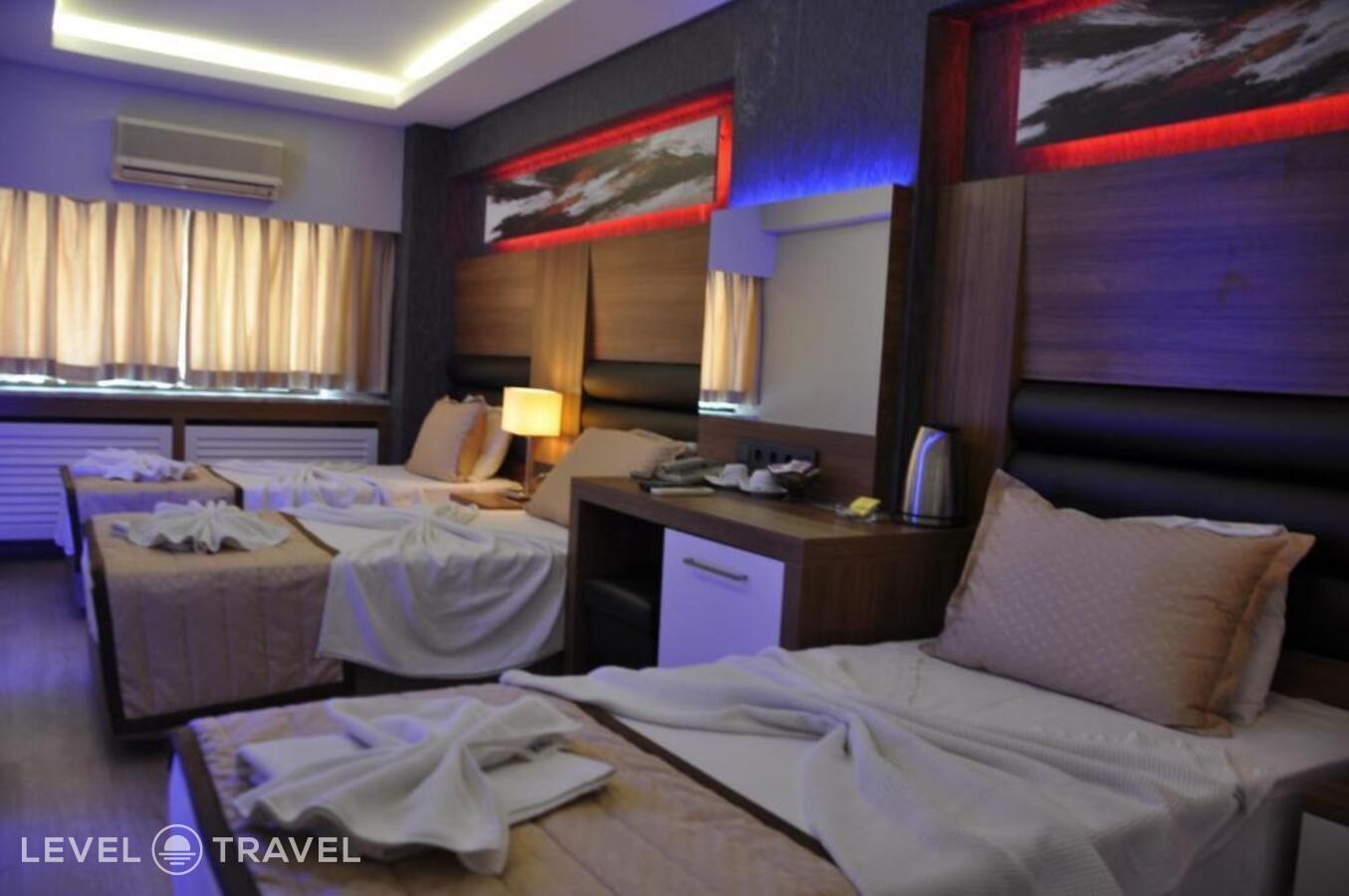 фотографии номера Трехместный номер отеля Otel Kabacam в Турция(Измир) - фото №18