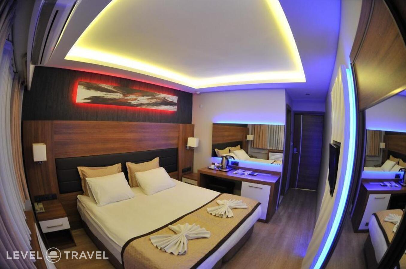 фотографии номера Трехместный номер отеля Otel Kabacam в Турция(Измир) - фото №30