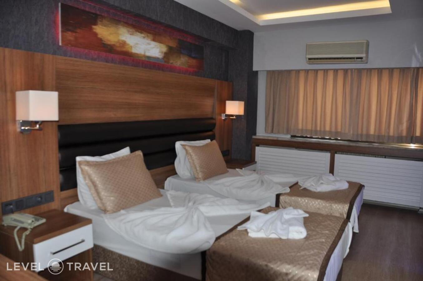 фотографии номера Трехместный номер отеля Otel Kabacam в Турция(Измир) - фото №11